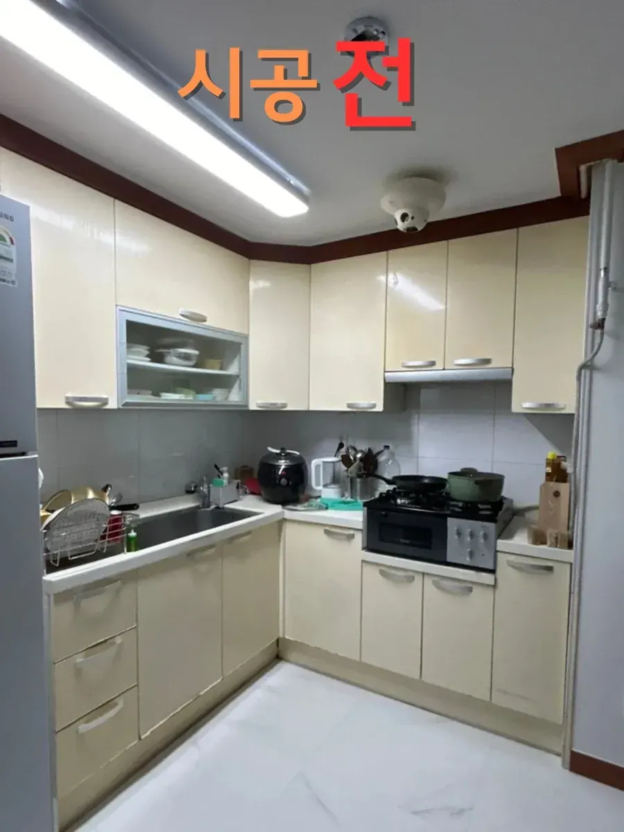 베이지색 문짝의 ㄱ자 주방 시공 전